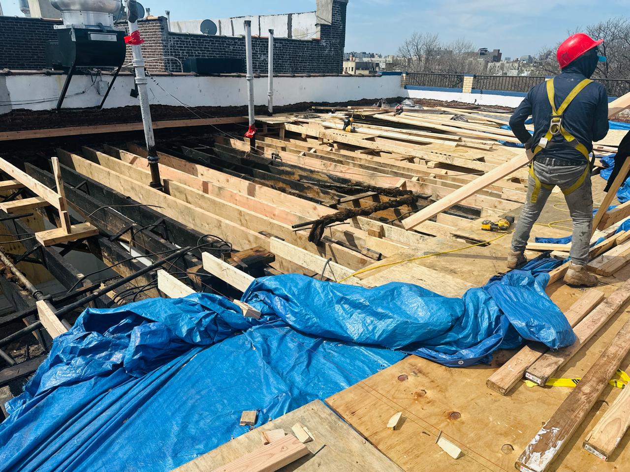 Fire-damaged roof conditions exposed for engineering review