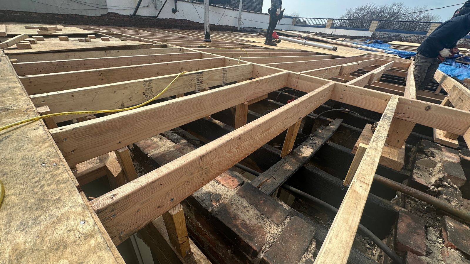 Compromised roof components reframed and reinforced