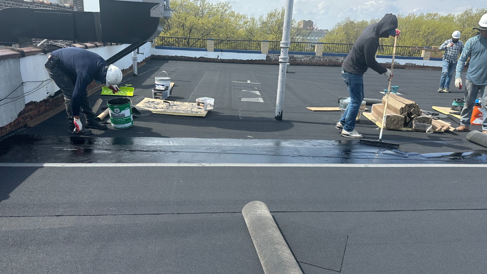 Waterproofing membrane installation performed under observation